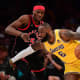Los Angeles Lakers forward LeBron James (6) moves to the basket against Toronto Raptors forward Precious Achiuwa (5) during the first half at Crypto.com Arena